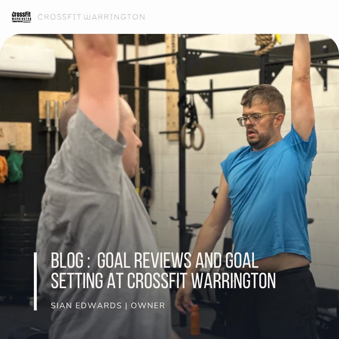 Two members reaching overhead in the gym, with the blog title over the photo