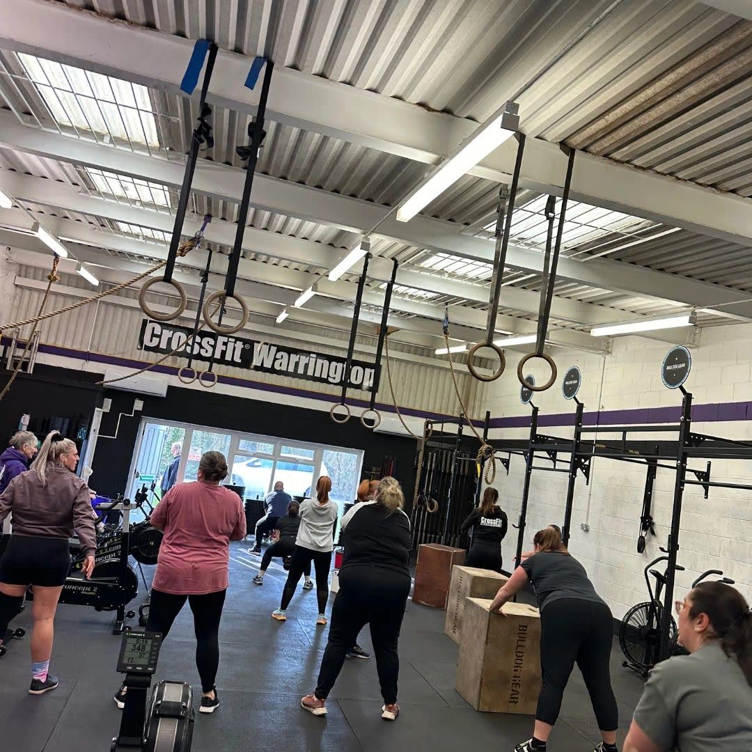 A team training together across the gym floor