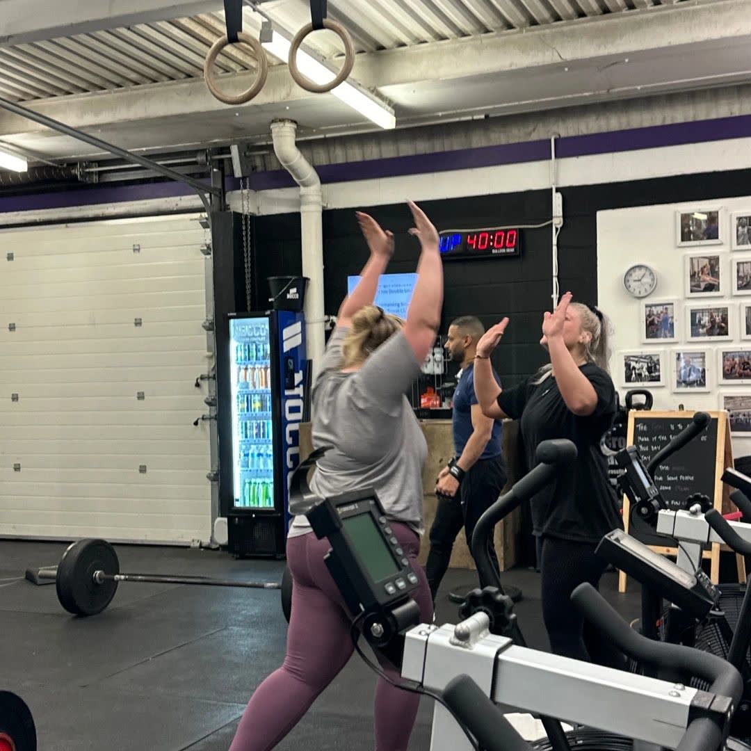 Athletes cheering during a team session